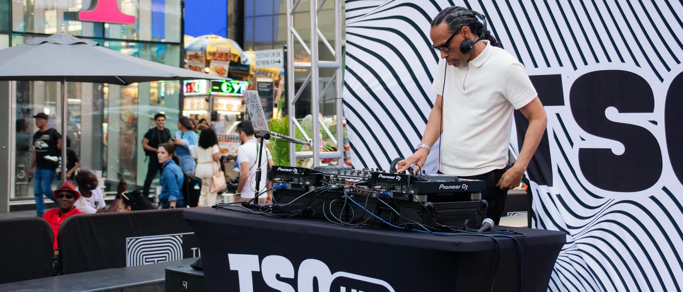 A DJ performing a set during TSQ LIVE 2024