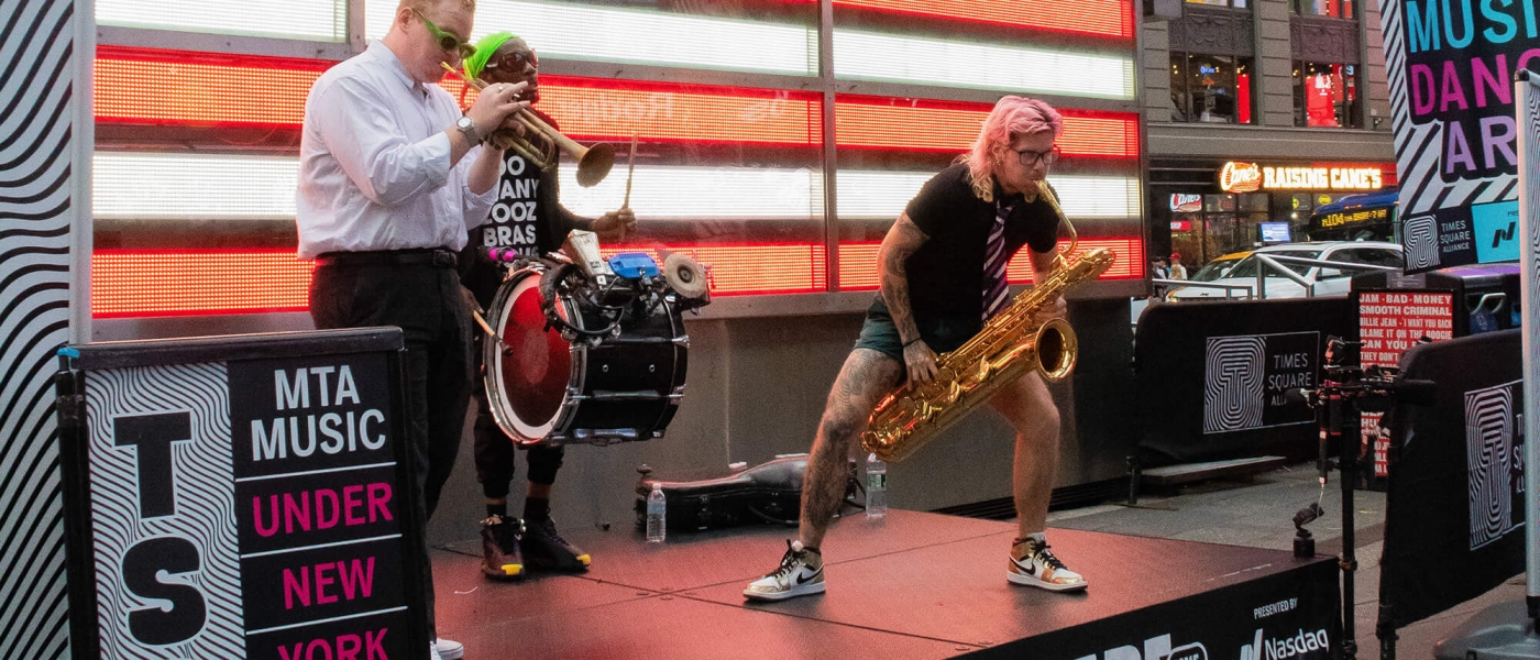 Too Many Zooz performing in Times Square as part of the MTA Music series for TSQ LIVE 2024