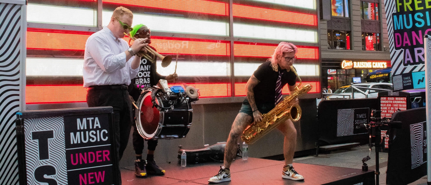 Too Many Zooz performing in Times Square as part of the MTA Music series for TSQ LIVE 2024