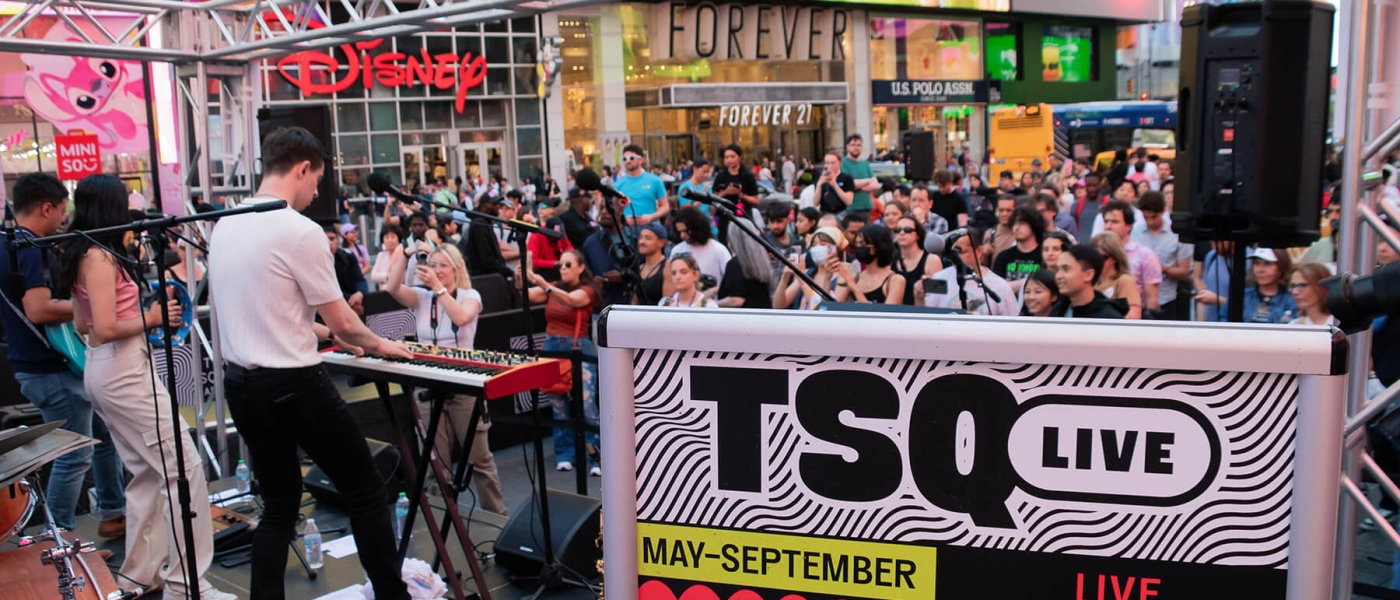 A band performing a Summer Fridays concert for TSQ LIVE 2024