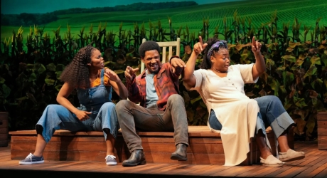 Brittany Inge, Tory Kittles, and Stori Ayers joking with each other in a set that looks like a field in Home on Broadway